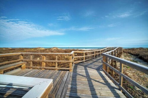 Beach Boardwalk Access Pool + Remodeled Interior Tropical Haven by Avantstay