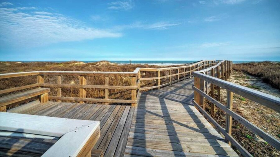 Beach Boardwalk Access Pool + Remodeled Interior Tropical Haven by Avantstay