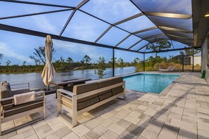 A heated pool - The Artis Cape Coral: Your Dream Vacation Awaits! (Cape Coral)