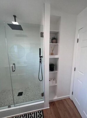 Shower, hair dryer, towels, soap