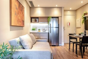 Living room - Estudio com AC e vaga (São Paulo)