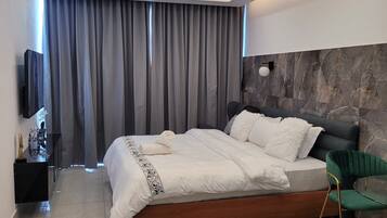 Estúdio superluxo, vista para a cidade | Ferros/tábuas de passar roupa, Wi-Fi de cortesia