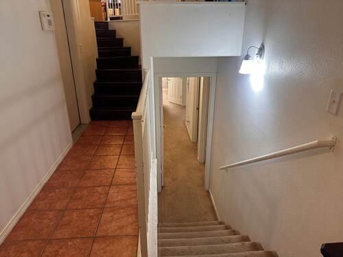 Cozy large home with. Downstairs with a closed door will be the rented space 