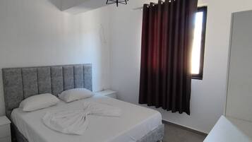 Apartment, 1 Bedroom, Balcony, Sea View | 1 bedroom, desk, laptop workspace, free WiFi