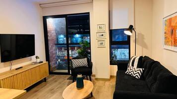 60-inch Smart TV with digital channels, Netflix, heated floors