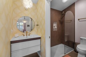 Hair dryer, towels, soap, shampoo