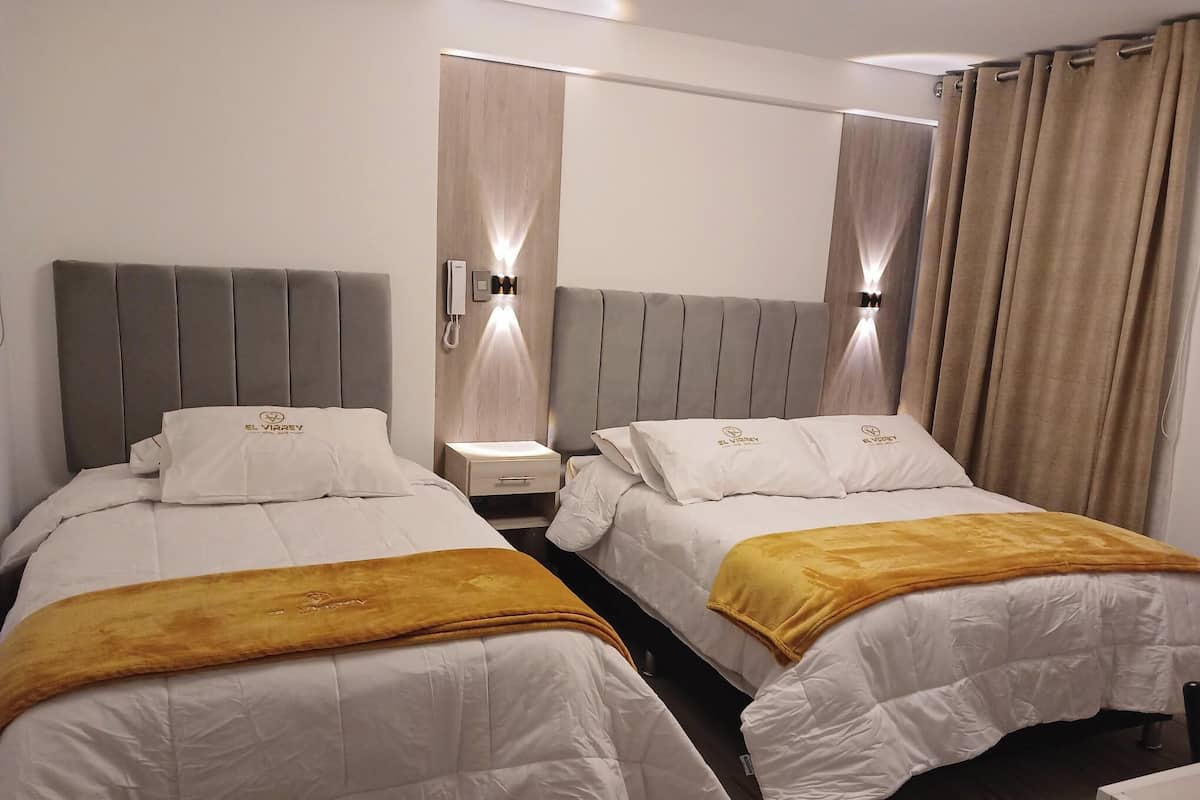 Family Room | Down comforters, Select Comfort beds, individually decorated, desk