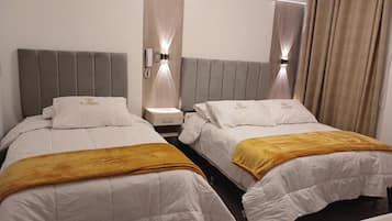 Family Room | Down duvets, Select Comfort beds, individually decorated, desk