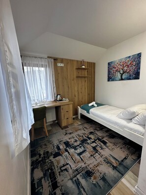 Ropa de cama de alta calidad y escritorio