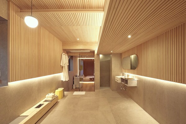 Separate tub and shower, hair dryer, towels, shampoo