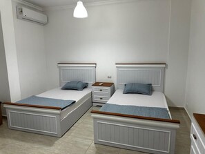 2 habitaciones, tabla de planchar con plancha, wifi y ropa de cama 