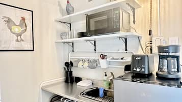 Fridge, microwave, coffee/tea maker, toaster