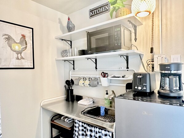 Fridge, microwave, coffee/tea maker, toaster