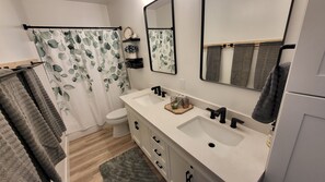 Hair dryer, towels, soap, shampoo