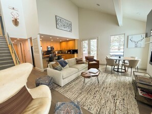 Smart TV, fireplace, books, offices