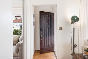 Interior - Enjoy indoor-outdoor living, a full kitchen, and vintage coastal charm. (Santa Barbara)