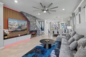 Smart TV, fireplace - Luxurious Vacation Home w/Private Pool, BBQ, Arcade Game Room, Netflix & Wifi.  (Clermont)