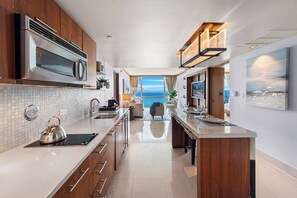 Microwave, stovetop, coffee/tea maker, electric kettle