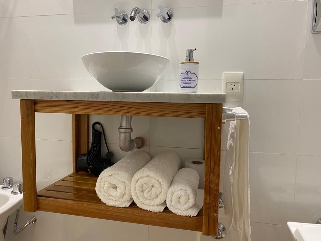 Hair dryer, towels, soap, shampoo