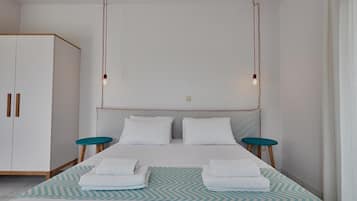 1 habitación, tabla de planchar con plancha, wifi gratis y ropa de cama