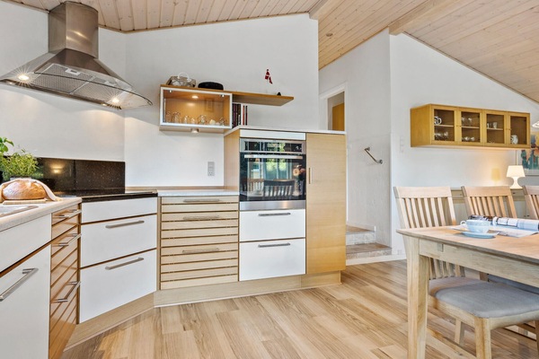 Fridge, stovetop, dishwasher, coffee/tea maker