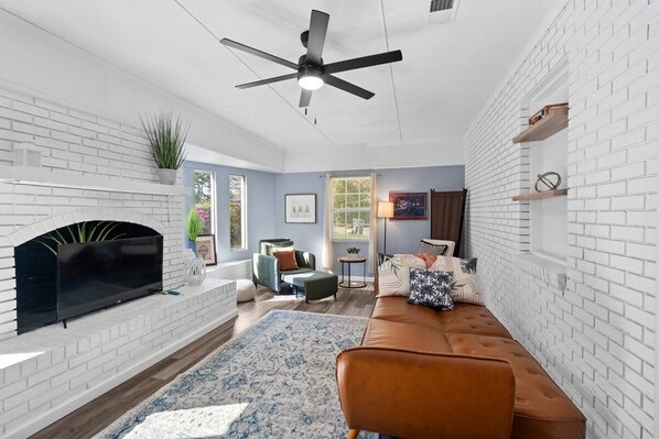 Smart TV, fireplace, books