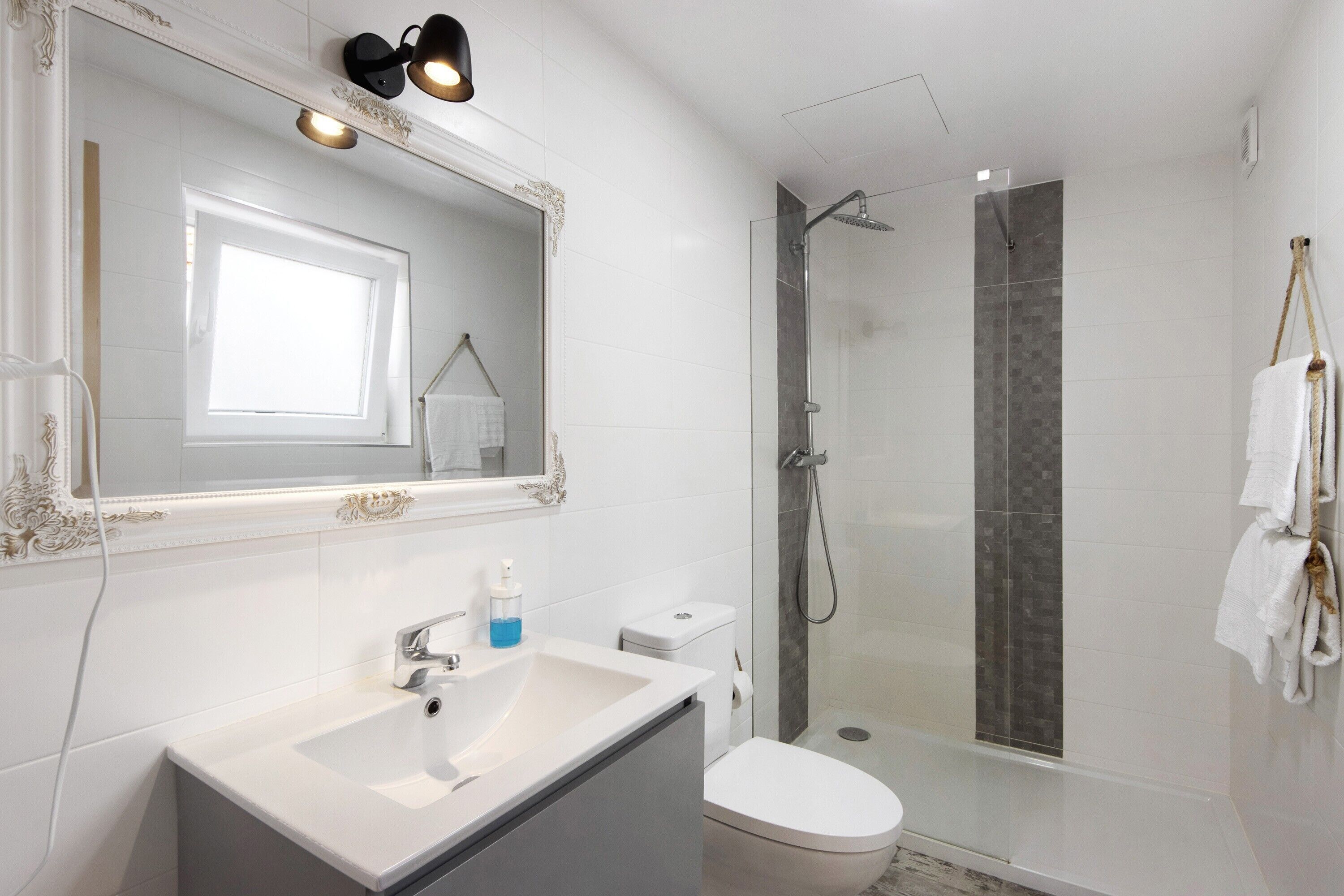 Shower, hair dryer, towels