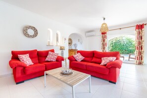 TV, fireplace - Villa 'Estrelitzia' with Private Pool, Wi-Fi and Air Conditioning (Cala Serena)