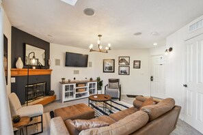 Smart TV, fireplace, books
