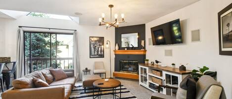 Smart TV, fireplace, books