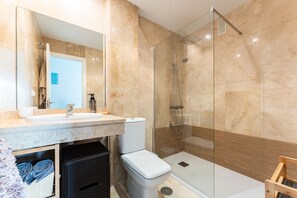 Shower, hair dryer, towels