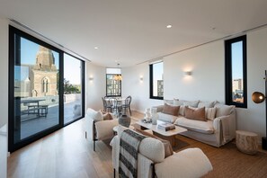 Ático de lujo, 2 habitaciones | Zona de estar