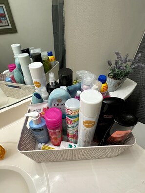 Hair dryer, towels, soap, shampoo