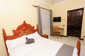 Deluxe Double Room, City View | Desk, laptop workspace, iron/ironing board, free WiFi - Sarai Hotel (Fort Portal)