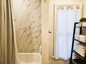Hair dryer, towels, soap, toilet paper
