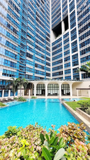 2 outdoor pools, open 8:00 AM to 8:00 PM, pool loungers - Andi and Frances' Place at BGC (Taguig)