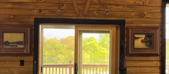 Nestled along the Mettowee River this charming  2-bedroom cabin in  Whitehall