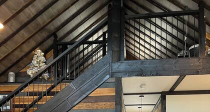 Nestled along the Mettowee River this charming 2-bedroom cabin in Whitehall