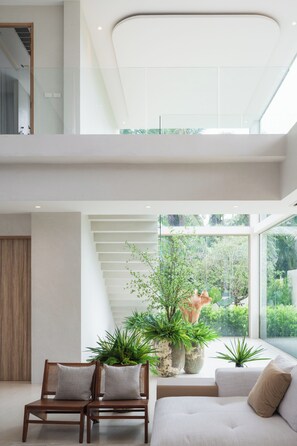 5 Bedrooms Private Pool Villa | Living area | 55-inch Smart TV with digital channels - Mahutsachan Klong Thom (Khlong Thom)