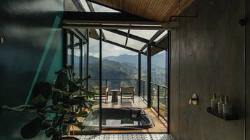 Deluxe Suite, Mountain View | Bathroom | Shower, towels, toilet paper