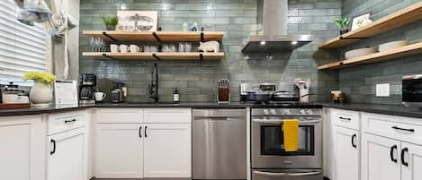 Coffee/tea maker, fridge, microwave, oven