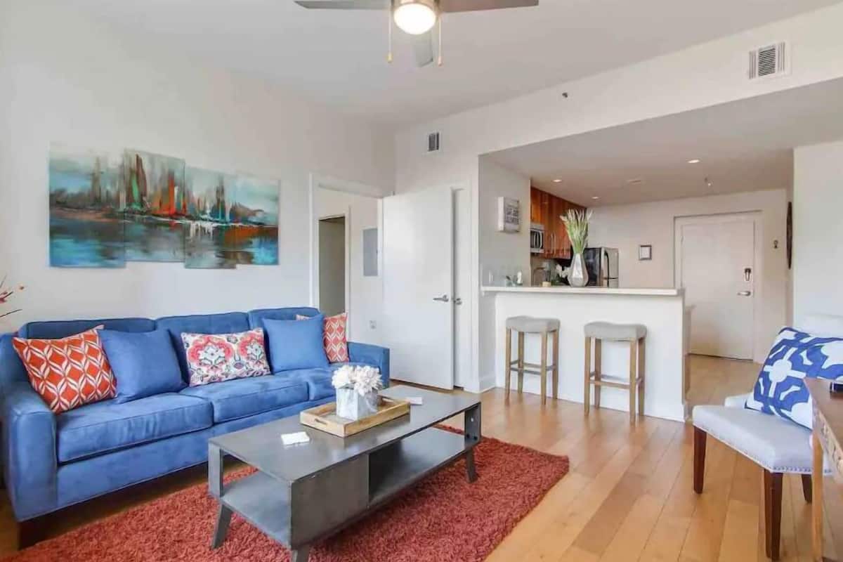 Premium Condo, 1 Bedroom, Pool Access, City View (1110) | Living area | 50-inch Smart TV with digital channels, streaming services