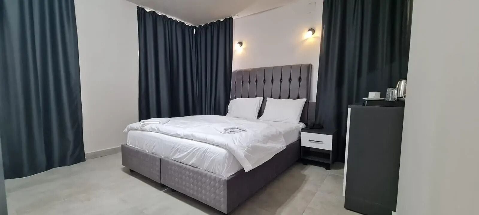 Desk, laptop workspace, free WiFi, bed sheets