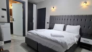 Desk, laptop workspace, free WiFi, bed sheets