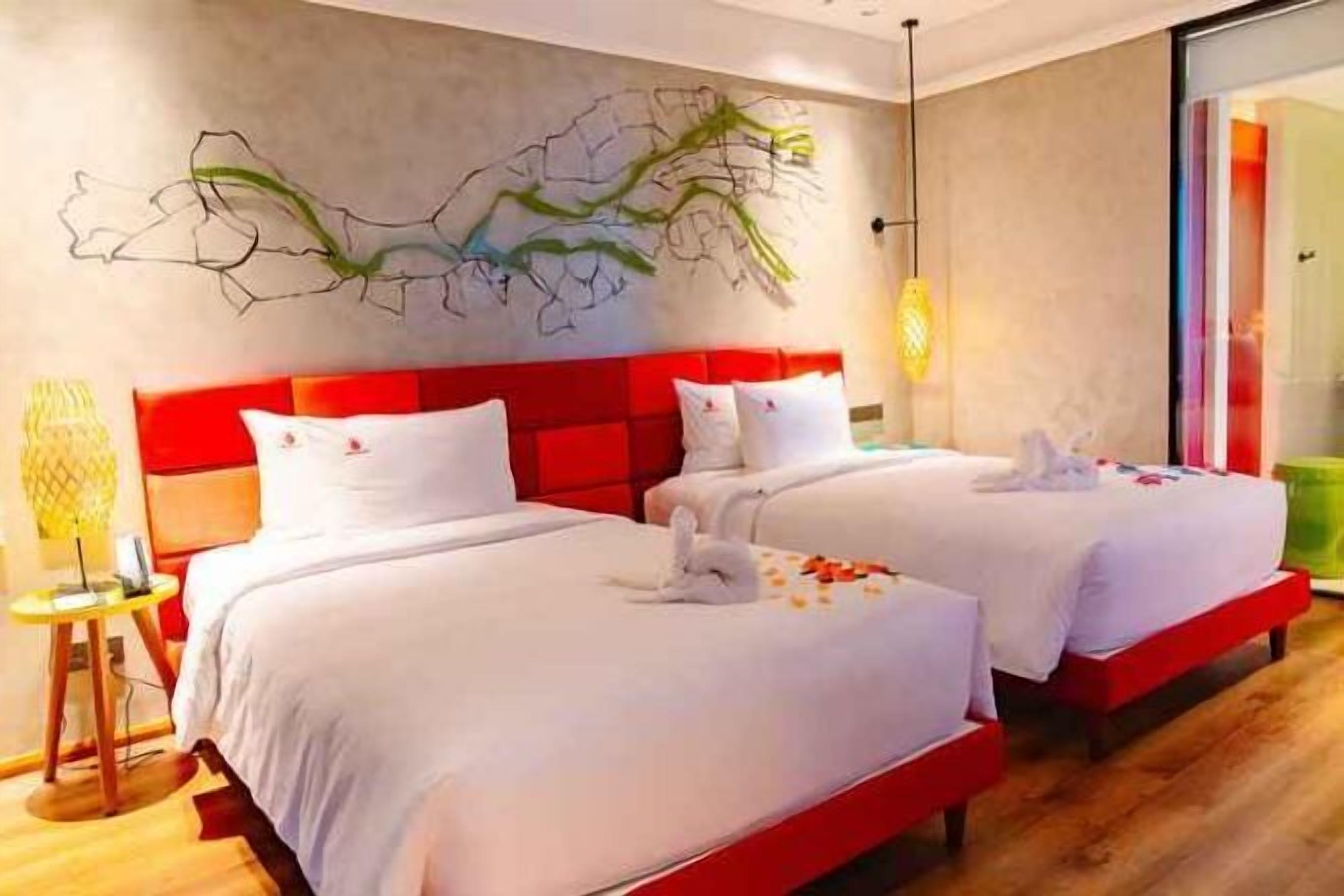 Premium bedding, memory foam beds, minibar, in-room safe