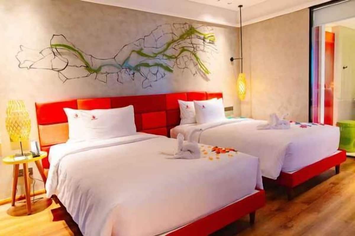 Premium bedding, memory-foam beds, minibar, in-room safe