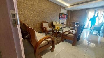 42-inch flat-screen TV with cable channels, DVD player