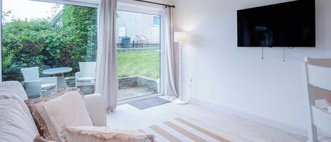 Standard Chalet | Living area | 32-inch flat-screen TV with cable channels