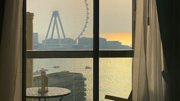 Deluxe Apartment, 1 Bedroom, Balcony, Partial Sea View | 2 bedrooms, blackout drapes, iron/ironing board, free WiFi