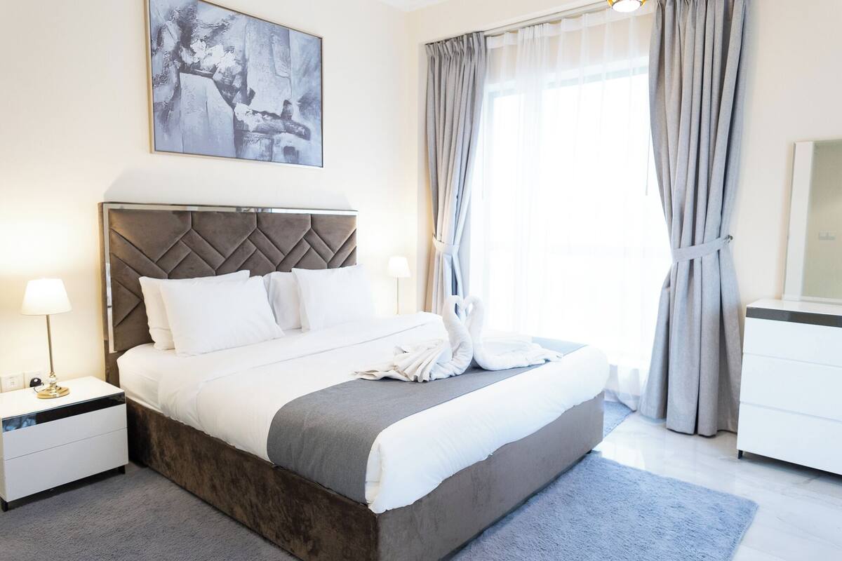 Deluxe Apartment, 2 Bedrooms, Balcony, Partial Sea View | Blackout curtains, iron/ironing board, free WiFi